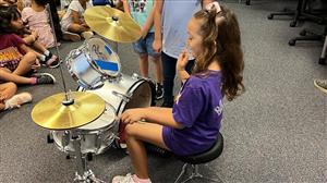 Student playing drums 