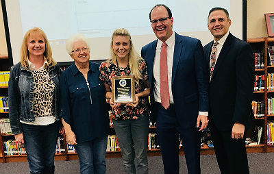 Spencer Emmons receiving the Jesse Parker Legacy Award