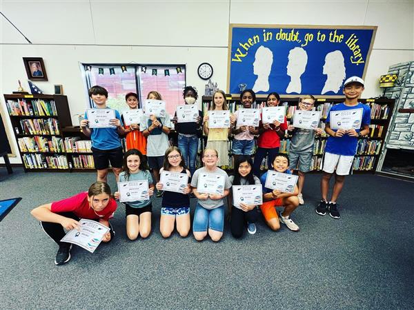 5th and 6th graders at Jacobson Elemenary met once a week and read 12 books over the year.  The team with the top score at Jacobson moved onto the district semi-finals in May 2022.