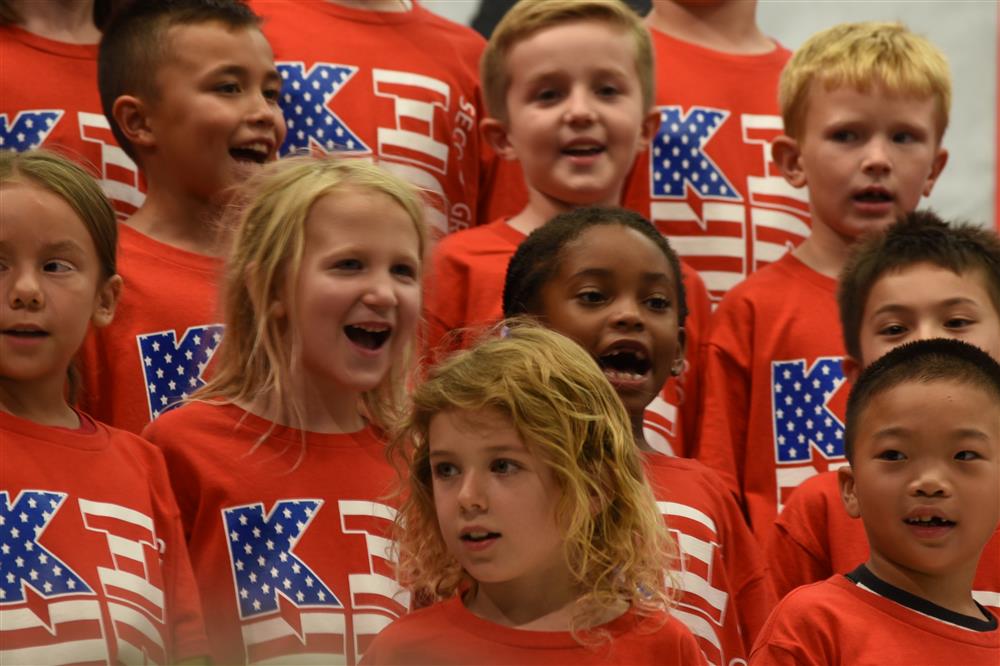 Second graders singing patriotic songs