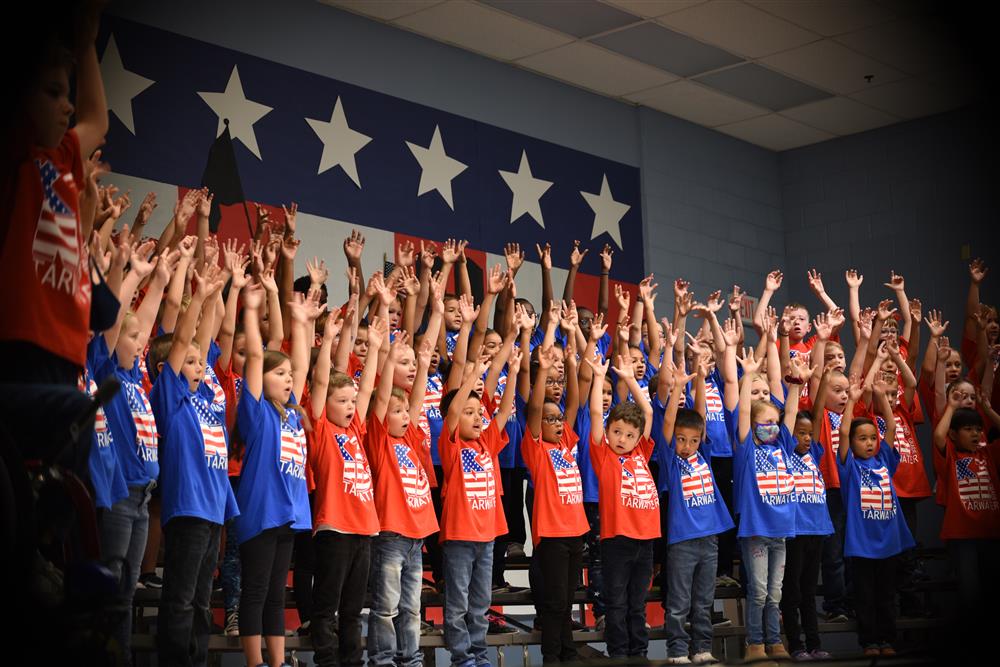 Second graders singing patriotic songs