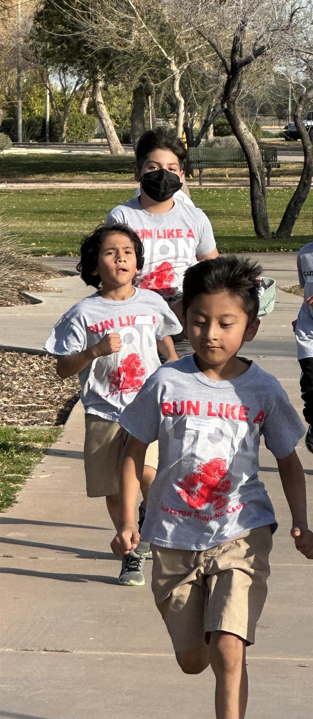 Running Club race students running.