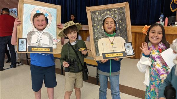 Students show important historical figures. 