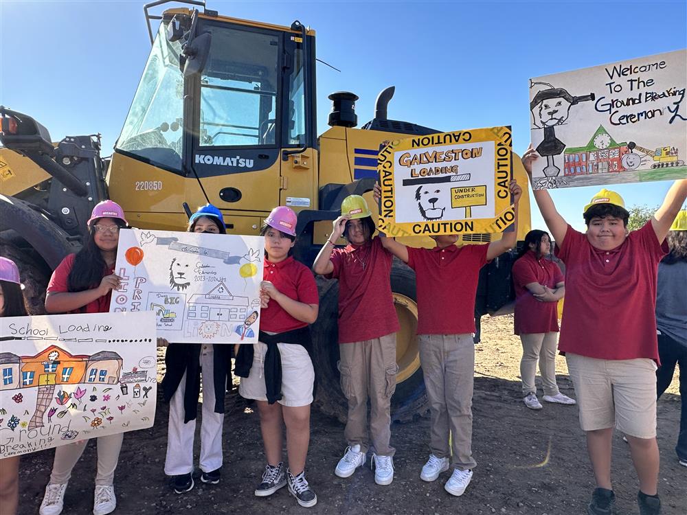 Galveston Elementary students with signs they made